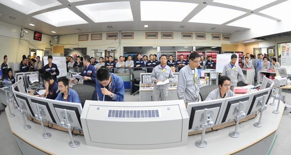 Workers bring CGN's Ling Ao Phase II unit 1 to first criticality in July 2010