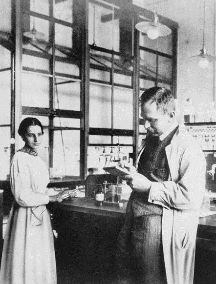 Lise Meitner and Otto Hahn in a laboratory circa 1913